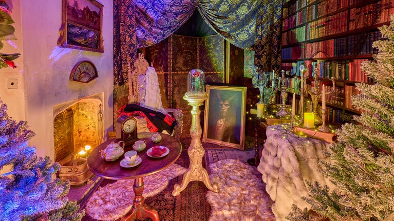 Christmas at Nymans with the Book Room dressed as a scene from The Beauty and The Beast